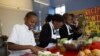 Students at Philip’s Academy harvest seasonal ingredients from their rooftop garden to create “seed-to-table” lunch meals. (Credit: Frank Mentesana)