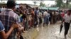 With Refugee Camps Overwhelmed, Rohingya Fleeing Myanmar Sleep on Roadsides 