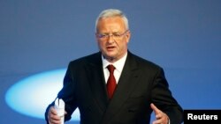 FILE - Volkswagen CEO Martin Winterkorn gives his closing speech during the Volkswagen group night ahead of the Frankfurt Motor Show (IAA) in Frankfurt, Germany, Sept. 14, 2015. 