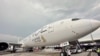 A Singapore airline aircraft is seen on tarmac after requesting an emergency landing at Bangkok's Suvarnabhumi International airport, Thailand