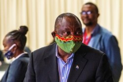 FILE - South African President Cyril Ramaphosa visits the coronavirus disease (COVID-19) treatment facilities in Johannesburg, April 24, 2020.