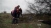 Ukrainian Volunteers Search for Bodies of Missing Soldiers