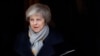 FILE - Britain's Prime Minister Theresa May leaves a cabinet meeting at Downing Street in London, Jan. 15, 2019.