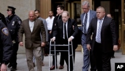 Harvey Weinstein, center, leaves court in New York, Jan. 6, 2020.