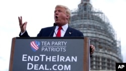 FILE - Republican presidential candidate Donald Trump speaks at a rally organized by Tea Party Patriots in on Capitol Hill in Washington, Sept. 9, 2015, to oppose the Iran nuclear agreement. 