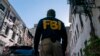 Arhiva: Agent FBI-a (FOTO: AP/John Minchillo)
