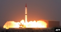FILE - This handout photograph released by Pakistan's Inter Services Public Relations (ISPR) on Dec. 11, 2015, shows a Shaheen III surface-to-surface ballistic missile launching from an undisclosed location in Pakistan.