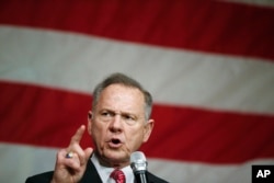 FILE - Former Alabama Chief Justice and U.S. Senate candidate Roy Moore speaks at a campaign rally in Fairhope, Ala., Dec. 5, 2017.