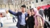 Chinese tourists take a selfie in Iran in this undated photo published by the Donya-e-Eqtesad newspaper in December 2019 (Credit: Donya-e-Eqtesad)