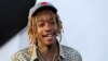 Wiz Khalifa arrives at the premiere of "Furious 7" at the TCL Chinese Theatre IMAX on April 1, 2015, in Los Angeles. 