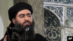 Le chef du groupe Etat islamique (EI), Abou Bakr al-Baghdadi, 5 juillet 2014.