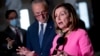 Ketua DPR Nancy Pelosi (kanan) menyebut tindakan Trump memperpanjang stimulus Covid-19 "tidak konstitusional."