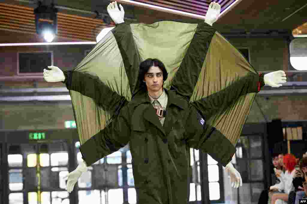 A model presents a creation by Chinese designer Xander Zhou on the third day of the Spring/Summer 2019 London Fashion Week Men's fashion event in London.