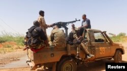 Wanajeshi wa jeshi la Sudan wakipiga doria mjini Omdurman