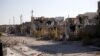 FILE - Destroyed buildings are seen in the city of Ramadi, January 16, 2016. Ramadi was freed of IS extremists in December 2015 after a fierce battle and more than 600 bombings left much of the city in ruins, 100 kilometers west of the capital, Baghdad.