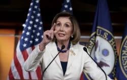 FILE - Speaker of the House Nancy Pelosi, D-Calif., meets with reporters at her weekly news conference at the Capitol in Washington, Dec. 5, 2019.