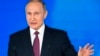 Poutine vante la force militaire de la Russie avant la présidentielle 
