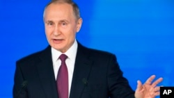 Vladimir Poutine lors de son discours Moscou, Russie, le 1er mars 2018