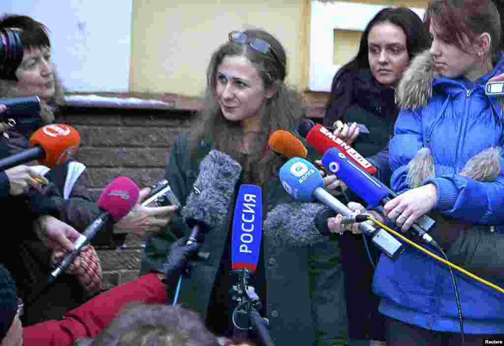 Maria Alekhina speaks to the media at the Committee Against Torture after being released from prison in Nizhny Novgorod, Russia, Dec. 23, 2013. 