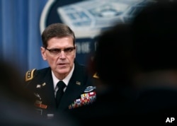 Gen. Joseph Votel speaks during a news conference with Defense Secretary Jim Mattis at the Pentagon, April 11, 2017. The commander of U.S. Central Command said it is looking to counter Iranian influence in the Middle East via cyberspace.
