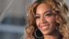 Beyoncé poses for pictures at a press conference June 22, 2009 in New York. 