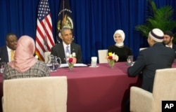 FILE - President Barack Obama meets with members of Muslim-American community at the Islamic Society of Baltimore, Feb. 3, 2016.