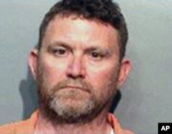 This undated photo provided by the Des Moines Police Department shows Scott Michael Greene, of Urbandale, Iowa. Des Moines and Urbandale Police said in a statement, Nov. 2, 2016, that they have identified Greene as a suspect in the killings.