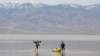 Kayakers Paddle in Death Valley After Rains Replenish Lake