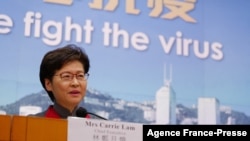 Hong Kong's Chief Executive Carrie Lam holds a press conference as her government announces strict new anti-coronavirus controls in Hong Kong, Jan. 5, 2022.