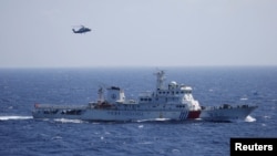 Milter China melakukan latihan di pulau Qilian Yu, bagian dari kepulauan Paracel di Laut China Selatan 14 Juli tahun lalu (foto: ilustrasi). 