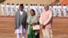 Indian Prime Minister Narendra Modi, right, stands with Nepalese Prime Minister Khadga Prasad Oli and his wife Radhika Shakya during a ceremonial reception for Oli in New Delhi, India, Saturday, April 7, 2018. 