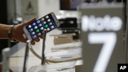 FILE - Samsung reportedly has a solution to the Galaxy Note 7 smartphone battery's vulnerability to overheating.