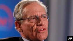 Former Washington Post reporter Bob Woodward speaks during an event sponsored by The Washington Post to commemorate the 40th anniversary of Watergate, June 11, 2012, at the Watergate office building in Washington. 