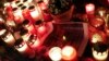 Candles burn at a Christmas market at Breitscheidplatz in Berlin, Germany, Dec. 20, 2016, to commemorate the 12 victims of a truck that ploughed into the crowded market. 