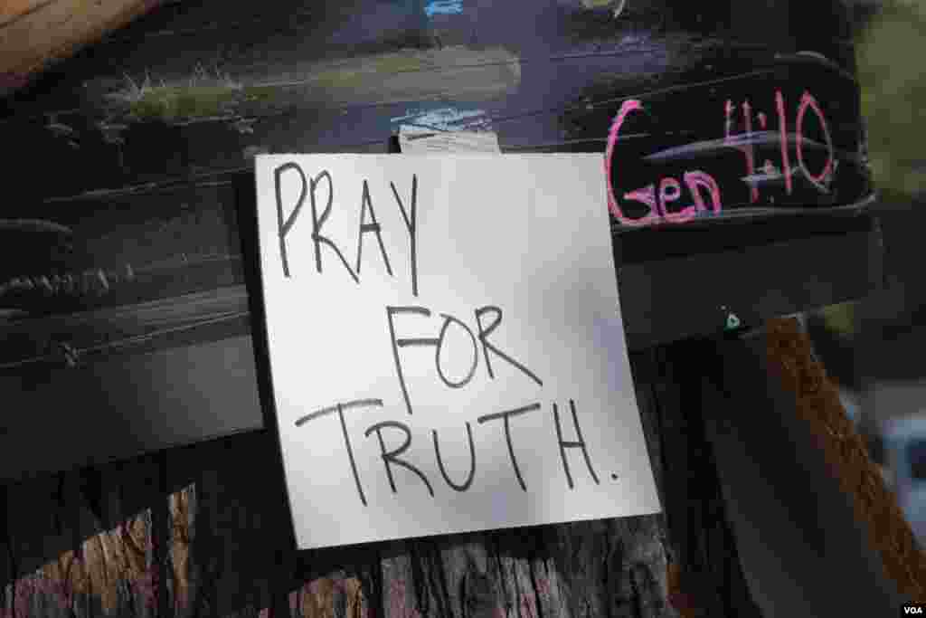 A sign in Ferguson, Missouri, after the shooting death of Michael Brown, Aug. 24, 2014. (Gesell Tobias/VOA)