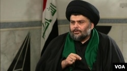 Shi'ite cleric Moqtada al-Sadr speaks with the Alhurra television network.