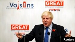 FILE - Britain's Foreign Secretary Boris Johnson gives a speech at the British Embassy during his European tour on Brexit, in Paris, France, Oct. 27, 2017.