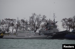 Ukrainian naval ships, which were recently seized by Russia's FSB security service, are seen anchored in a port in Kerch, Crimea, Nov. 28, 2018.