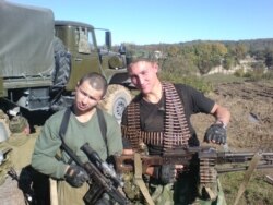 Vasily Kudrichev (r), Wagner PMC mercenary, who died in Syria, in Deir ez-Zor battle on February 7, 2018, pictured in Chechnya.