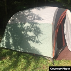 When we camp, we sometimes sleep in a tent on the ground. Some campers may sleep on a cot in a tent.