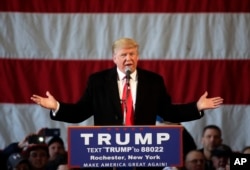 FILE - Republican presidential candidate Donald Trump speaks during a rally at JetSmart Aviation Services on Sunday, April 10, 2016, in Rochester, New York.