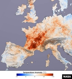 This image shows the differences in day time land surface temperatures collected in July 2001 and during the 2003 heat wave by the Moderate Resolution Imaging Spectroradiometer (MODIS) on NASA’s Terra satellite. (NASA/Reto Stockli and Robert Simmon, based