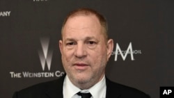 FILE - Harvey Weinstein arrives at The Weinstein Company and Netflix Golden Globes afterparty in Beverly Hills, California, Jan. 8, 2017.