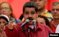 Venezuela's President Nicolas Maduro gives a speech at a rally against U.S President Donald Trump in Caracas, Venezuela, Aug. 14, 2017.