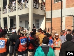 FILE -Emergency responders on scene of attack at Bacha Khan University in Charsadda, Pakistan, Jan. 20, 2016. (Photo: N. Takar / VOA Deewa)