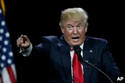 Republican presidential candidate Donald Trump speaks during the opening session of the Western Conservative Summit in Denver, July 1, 2016.