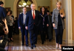 U.S. Senate Majority Leader Mitch McConnell (R-KY) leaves the Senate floor and walks back to his office on Capitol Hill in Washington, Jan. 24, 2019.