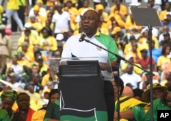 South African President Cyril Ramaphosa, delivers his party's election manifesto at the Moses Mabhida stadium in Durban, South Africa, Saturday, Jan 12, 2019 during the ruling party's 107th anniversary celebrations.
