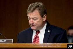 FILE - In this Feb. 14, 2017, photo, Sen. Dean Heller (R-N.V.) in Washington, on Capitol Hill, at a hearing.