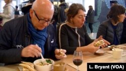 Architect Didier Fevre tucks into food from La Residence.